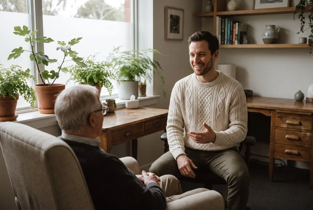 Chiropractor consulting with a patient